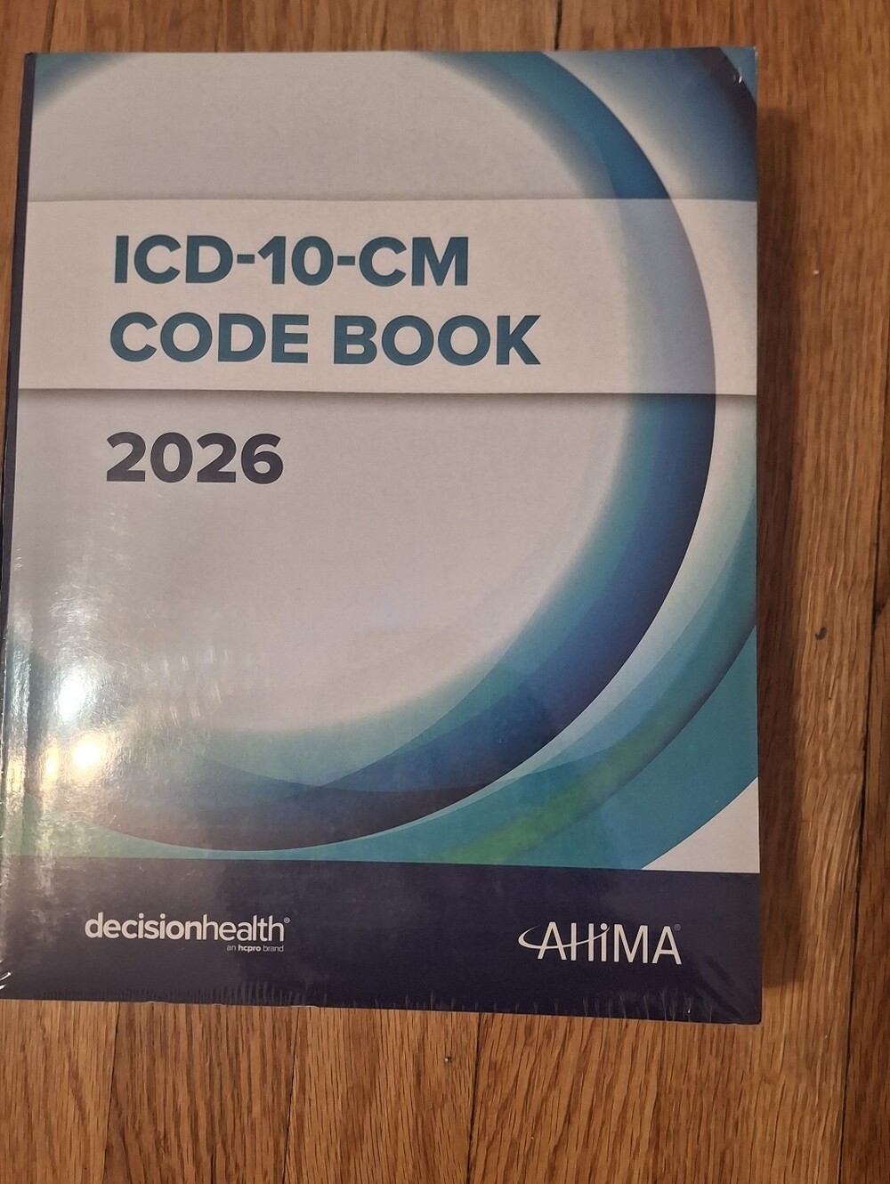 ICD-10-CM Code Book 2026 - Blue/Teal Accent